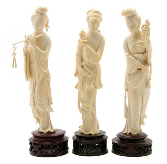 Appraisal: Group of Three Carved Ivory Figures one holding a teapot