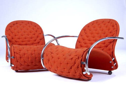 Appraisal: VERNER PANTON Pair of chairs upholstered in tufted orange fabric