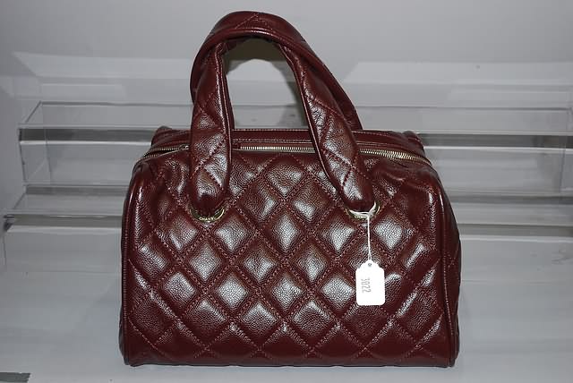 Appraisal: Chanel wine leather quilted satchel handbag with zipper large Price