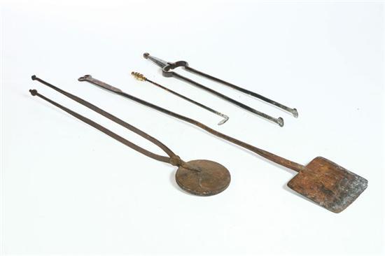 Appraisal: GROUP OF FIREPLACE IMPLEMENTS Nineteenth century iron Includes a large