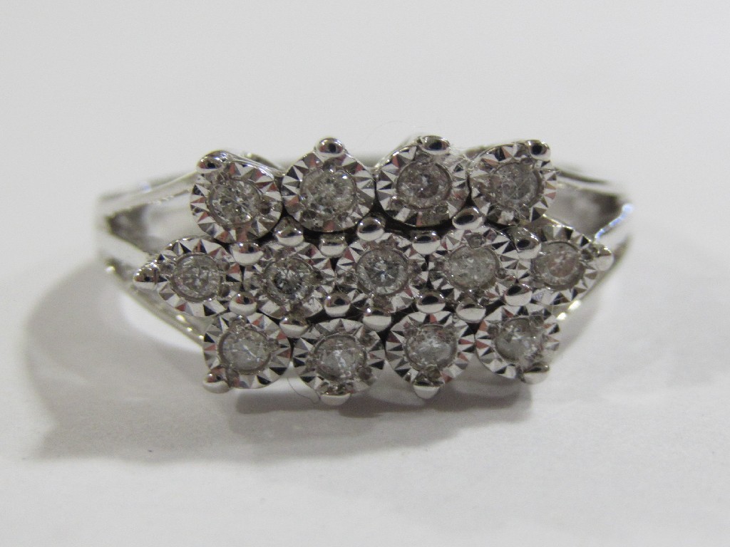 Appraisal: Nine carat white gold diamond cluster ring with triple row