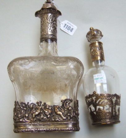 Appraisal: A glass liqueur decanter of tapered square form with a