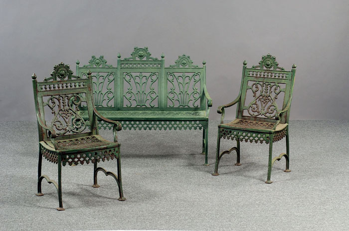 Appraisal: VICTORIAN CAST-IRON GARDEN BENCH AND A PAIR OF CAST-IRON ARMCHAIRS