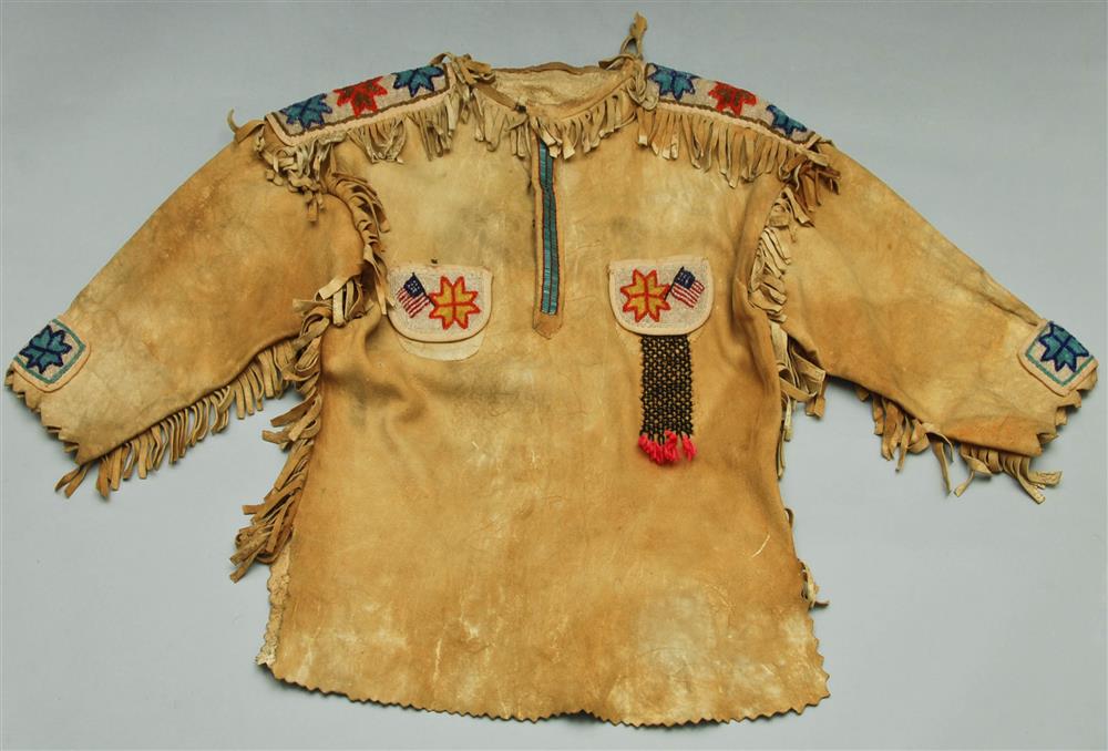 Appraisal: PLAINS BEADED AND FRINGED HIDE SHIRT turn of th Century