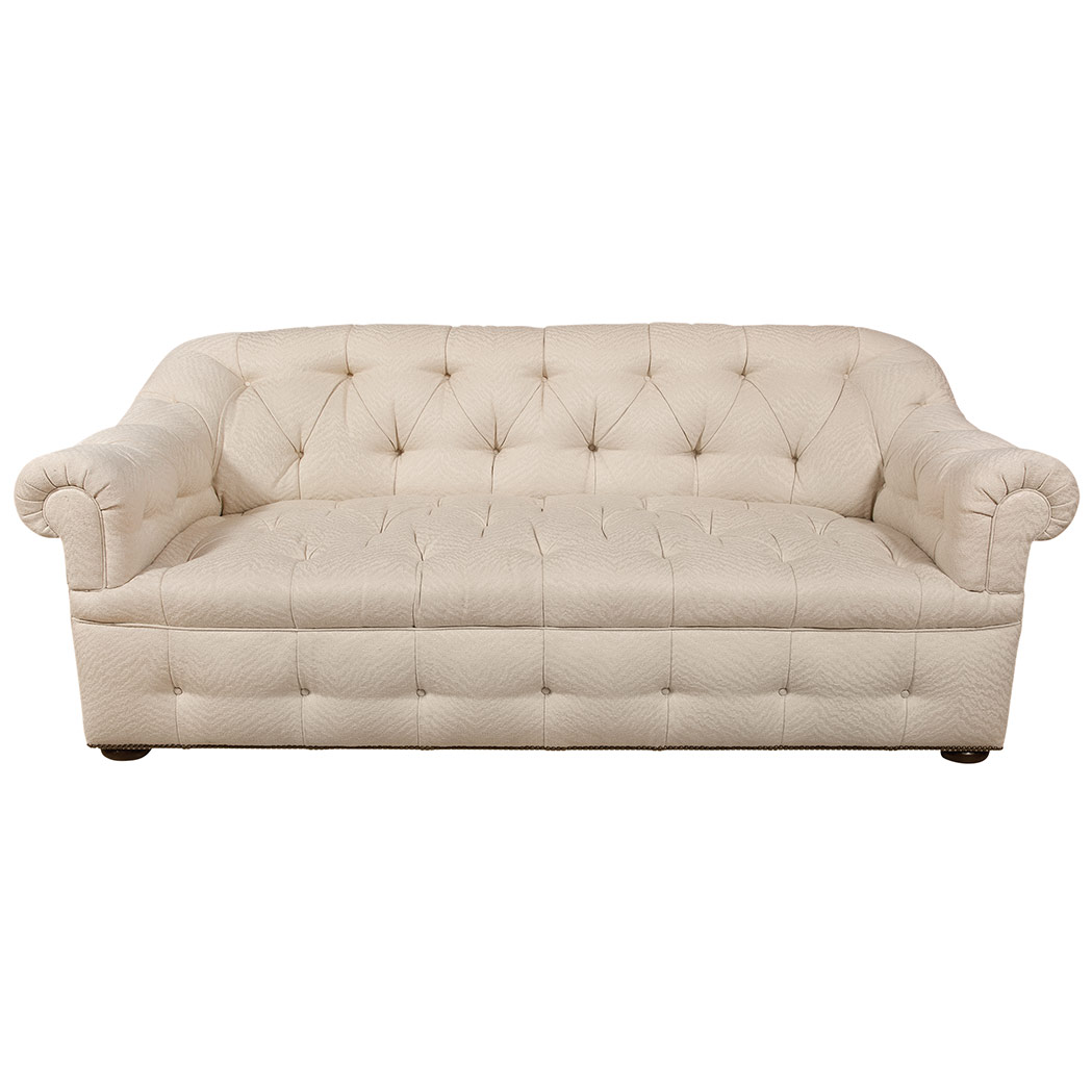 Appraisal: Upholstered Chesterfield Sofa Of U-shaped form with tufted backrest and