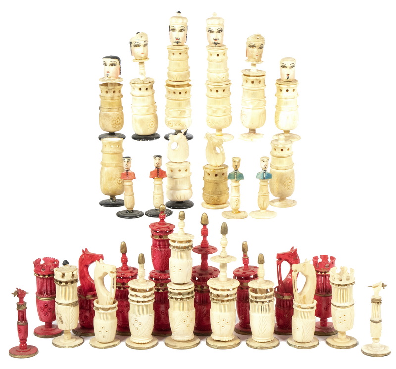 Appraisal: CARVED AND STAINED IVORY CHESS SETS Lot of Late th