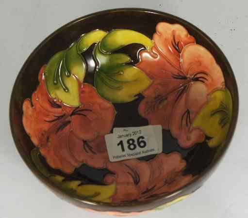 Appraisal: Moorcroft Bowl decorated in the Hibiscus Design on Brown Background