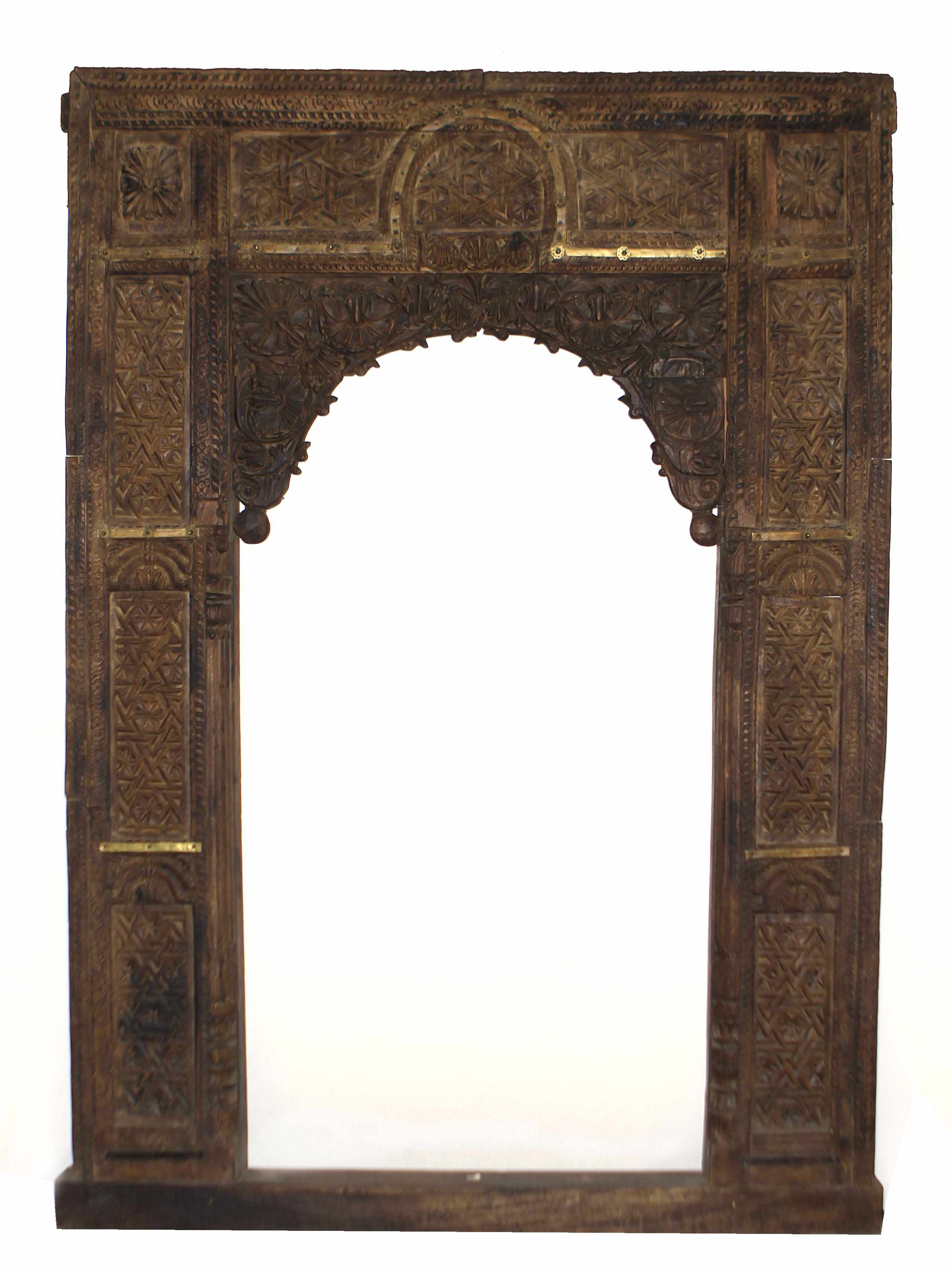 Appraisal: An Indian carved door and surround height in width in