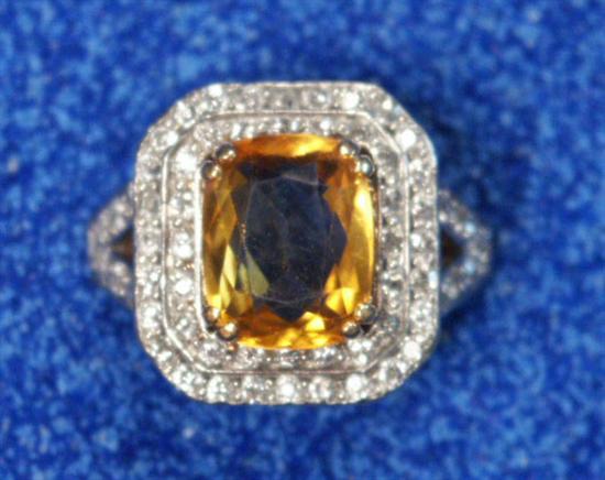 Appraisal: K YELLOW GOLD CITRINE AND DIAMOND RING the central cushion