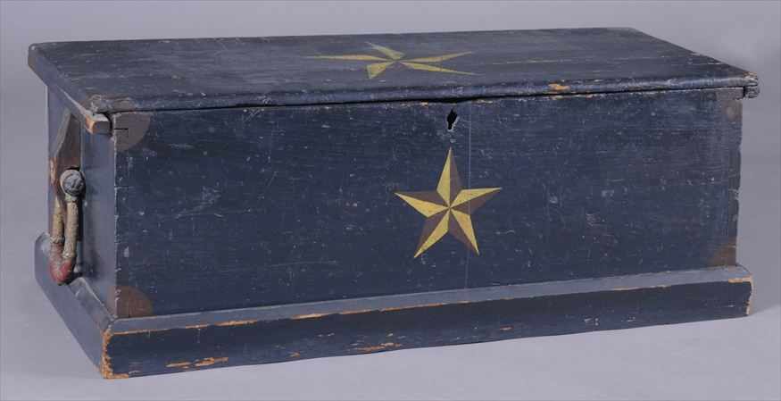 Appraisal: DARK BLUE-PAINTED SEA CHEST The hinged top and dovetailed case