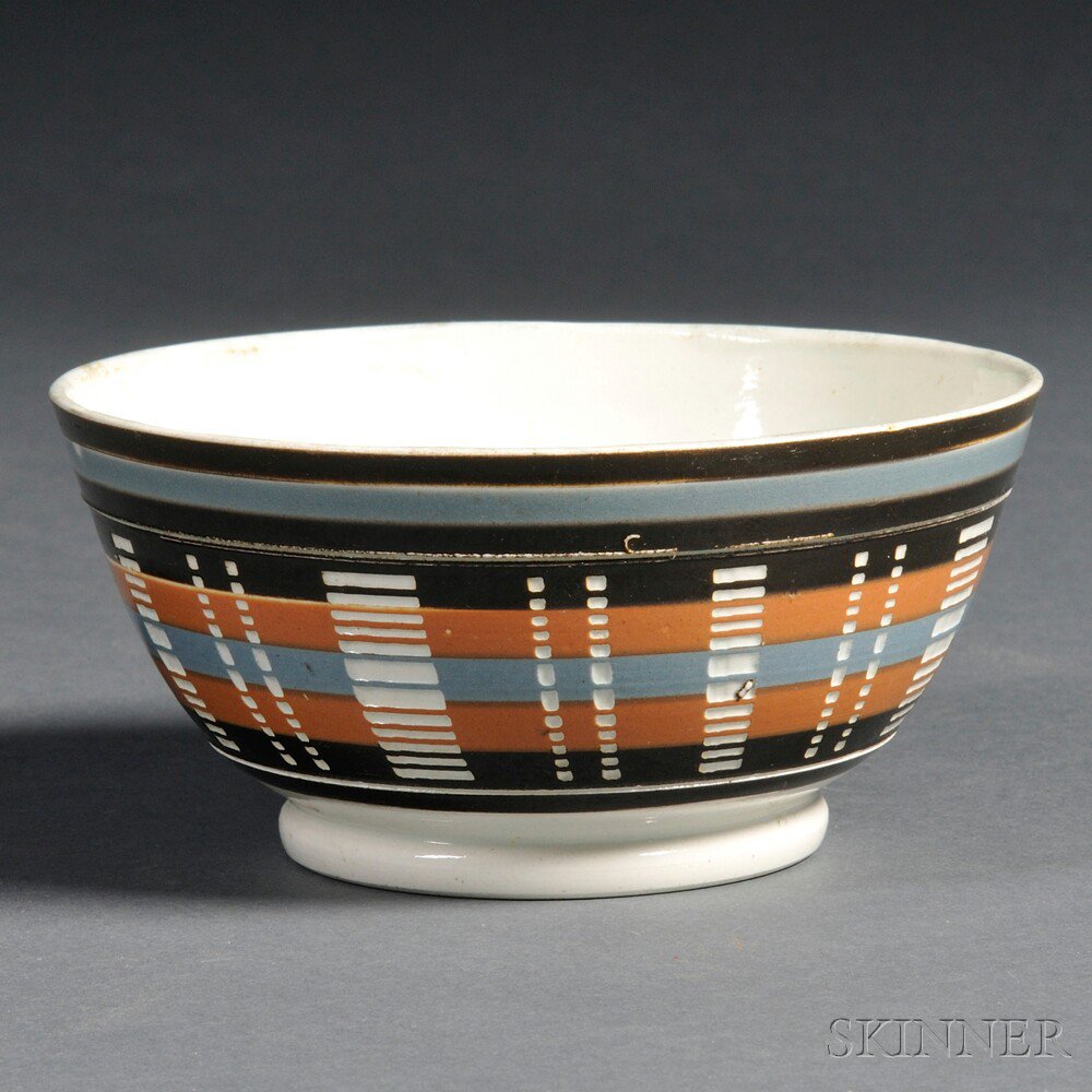 Appraisal: Striped Engine-turned Mochaware Pottery Bowl Britain early th century the