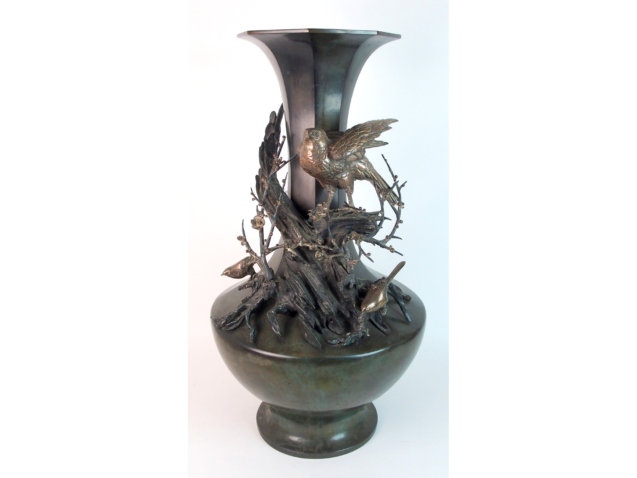 Appraisal: A large Japanese bronze baluster vasethe octagonal neck supporting a