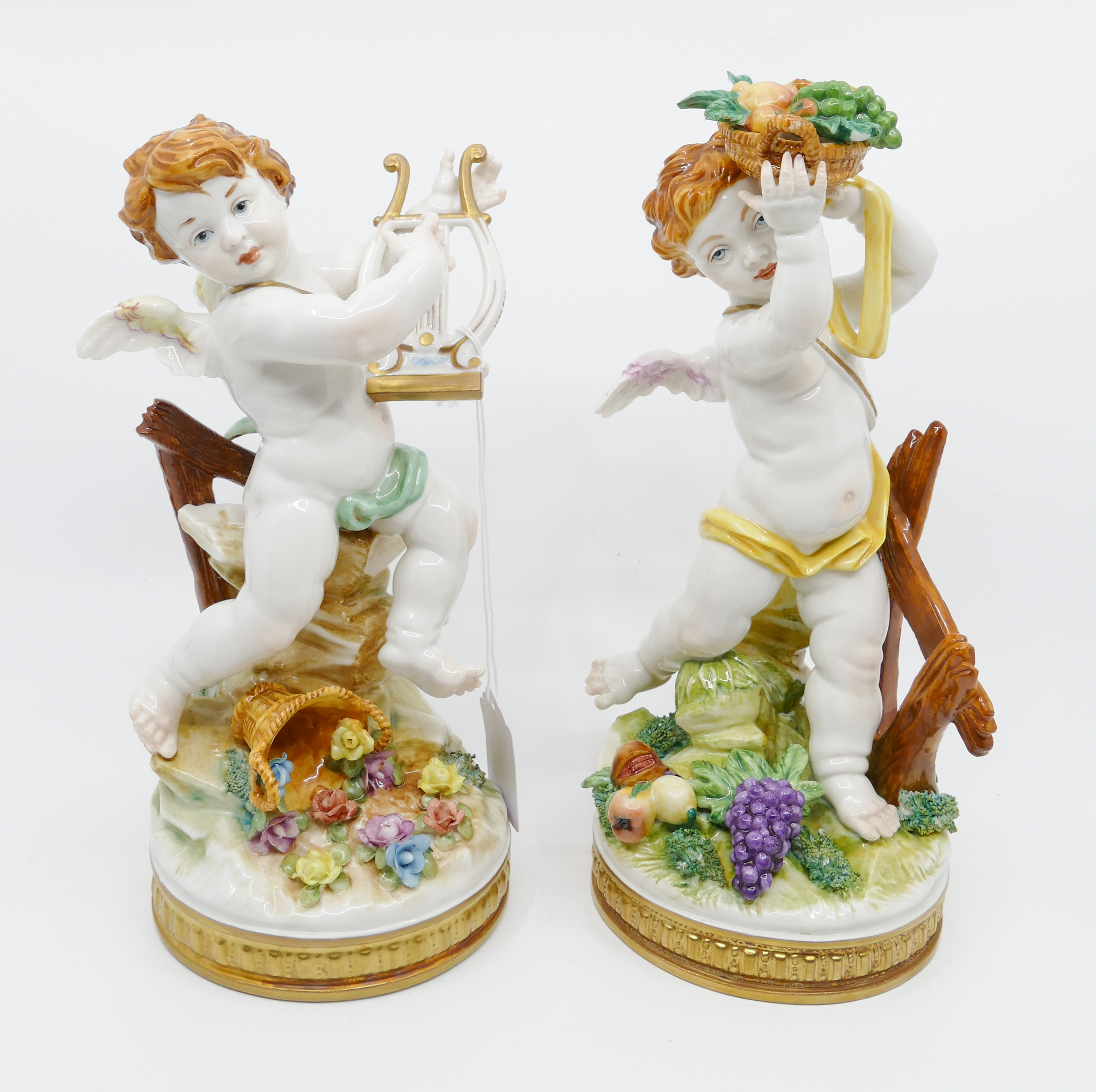 Appraisal: pc Algora Spain Porcelain Cherub Figurines from 'The Four Seasons'