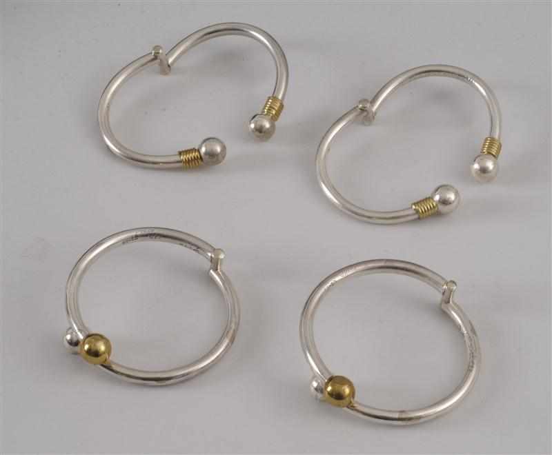 Appraisal: FOUR STERLING SILVER SLAVE BRACELETS Provenance The Estate of Marjorie