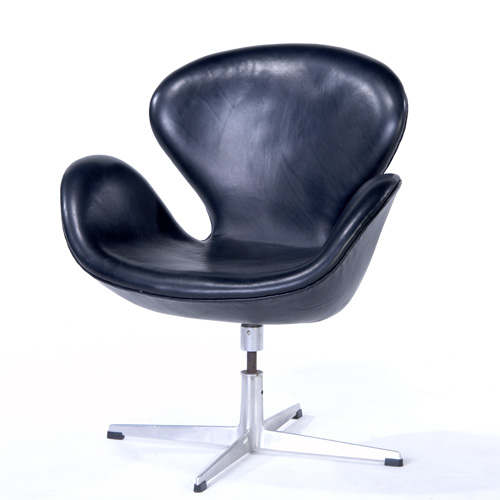 Appraisal: ARNE JACOBSEN Swan swivel chair upholstered in black leather on