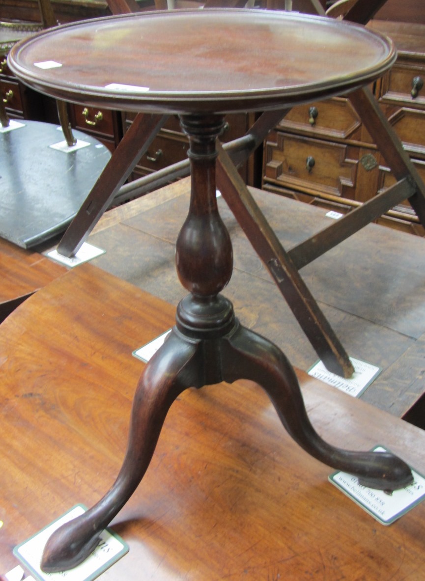 Appraisal: A George III and later mahogany tripod kettle stand cm