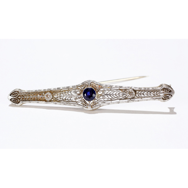 Appraisal: White gold K filigree sapphire diamond pin dwt W