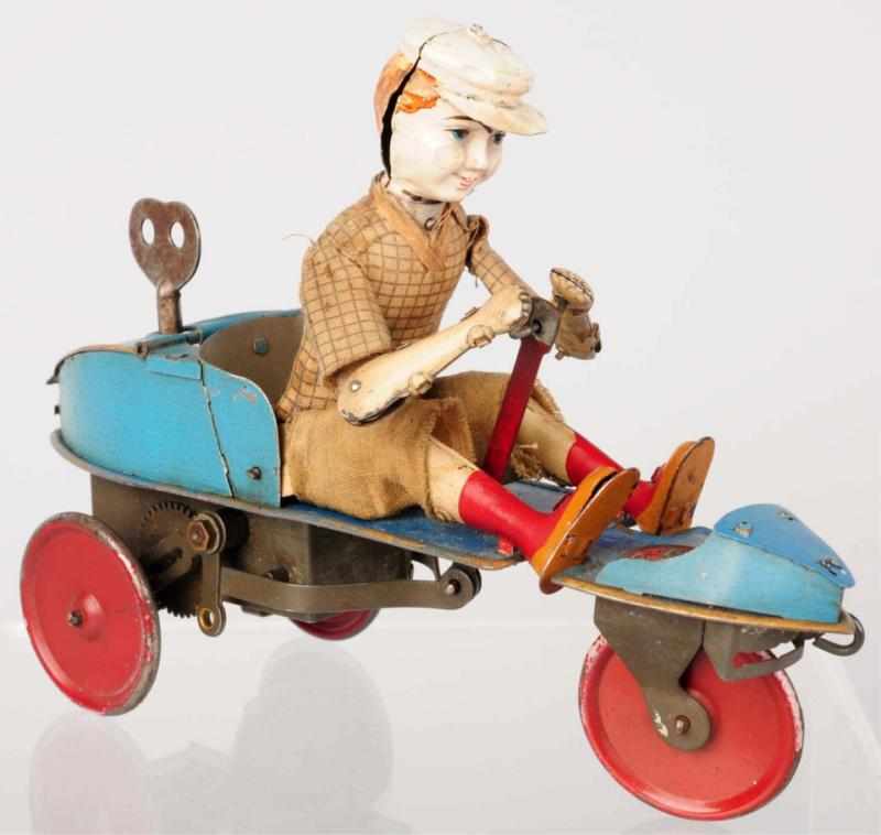 Appraisal: Tin Litho Martin Scooter Wind-Up Toy French Working Hand-painted figure