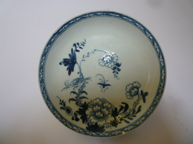 Appraisal: A CHAFFER'S LIVERPOOL PORCELAIN SAUCER painted in underglaze blue with