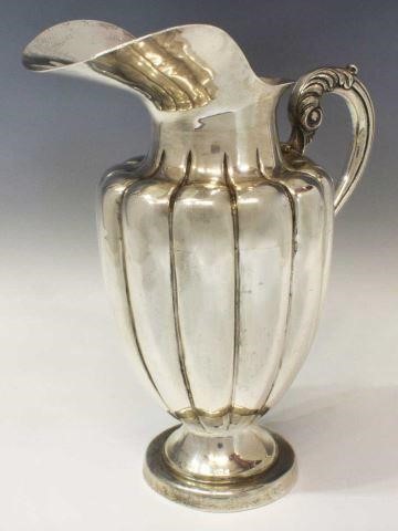 Appraisal: Sterling silver helmet-form water pitcher with acanthus scroll handle wide