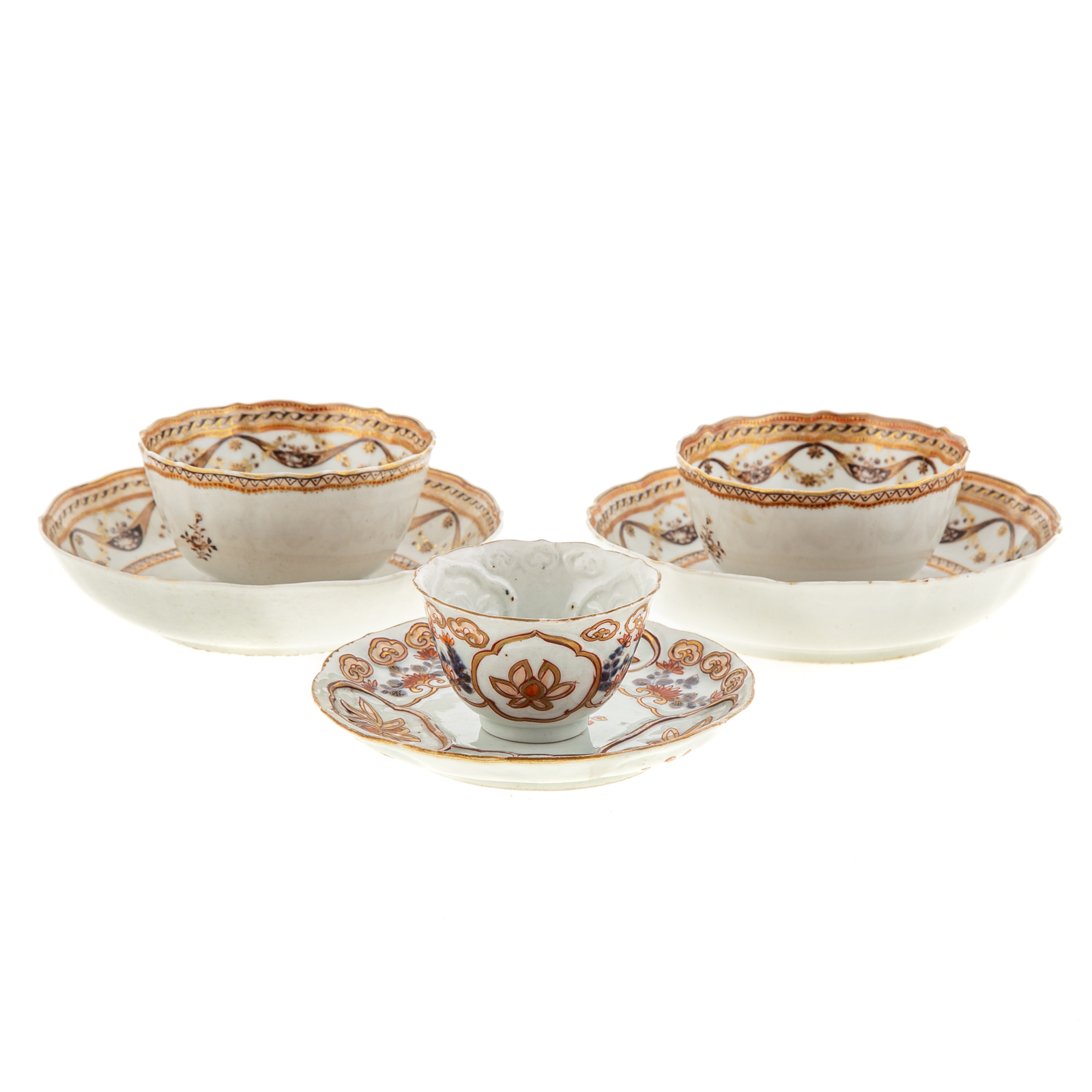 Appraisal: THREE CHINESE EXPORT TEA BOWLS SAUCERS Includes a pair sepia