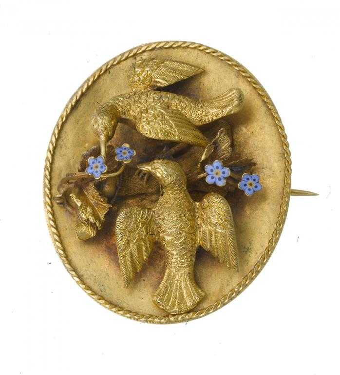 Appraisal: AN ANTIQUE GOLD AND ENAMEL LOCKET applied with doves and