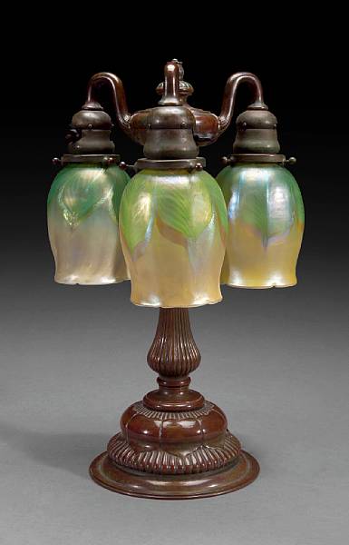 Appraisal: A Tiffany Studios Favrile glass and patinated bronze three light