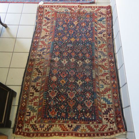 Appraisal: Kazak Caucasian Handmade Rug fine geometric stars red blue ivory