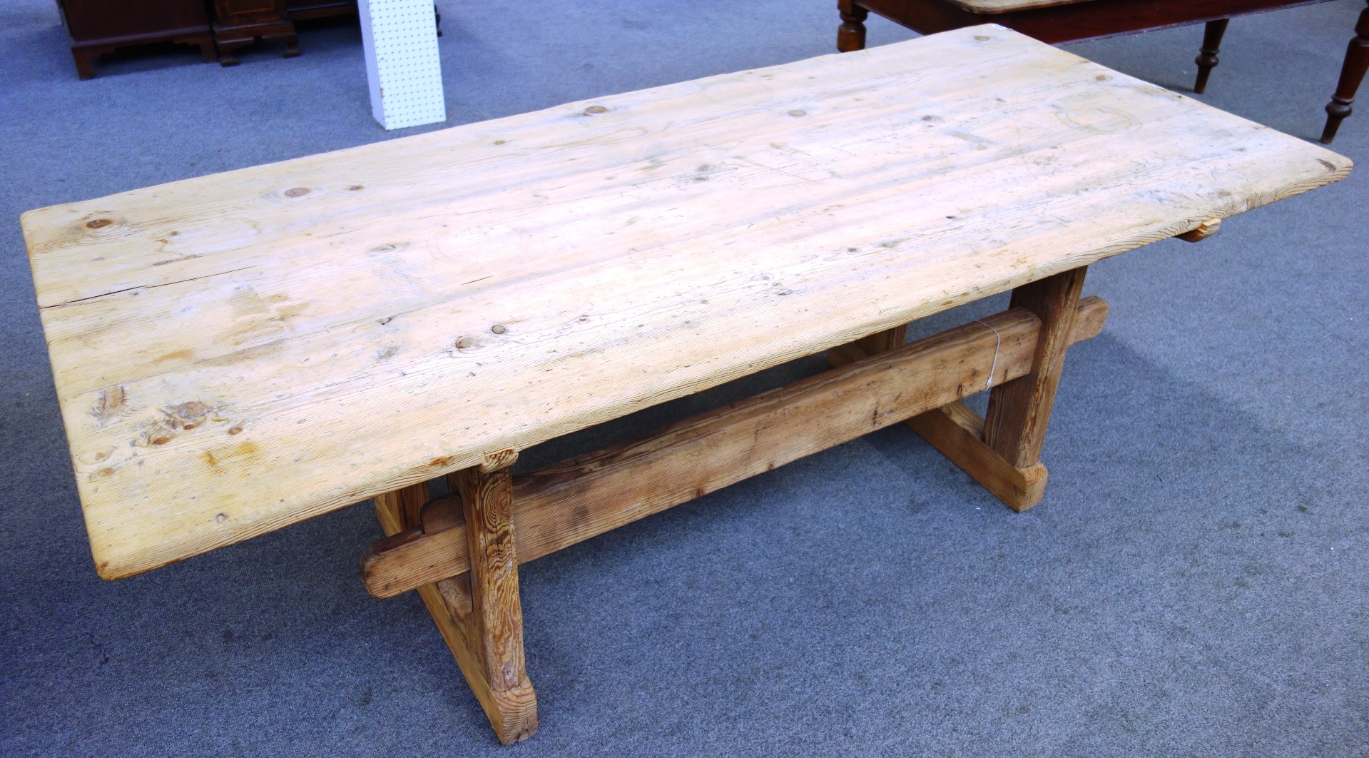 Appraisal: A stripped pine rectangular kitchen table with double stretcher support