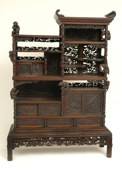 Appraisal: AN IMPRESSIVE JAPANESE ROSEWOOD DISPLAY CABINET Qing Dynasty The serpent