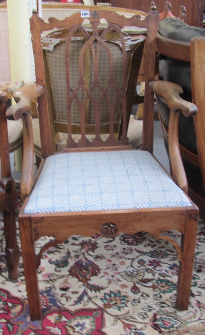 Appraisal: A George III mahogany Gothic revival carver chair on canted