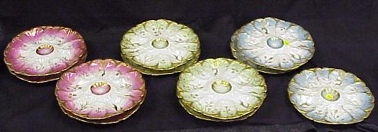 Appraisal: Limoges gilt decorated oyster plates all with seaweed motif dia