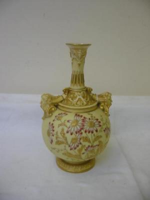 Appraisal: A ROYAL WORCESTER PORCELAIN VASE of urn form with mask