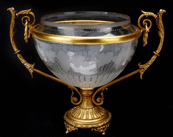 Appraisal: A gilt bronze mounted acid etched glass centerpiece height in