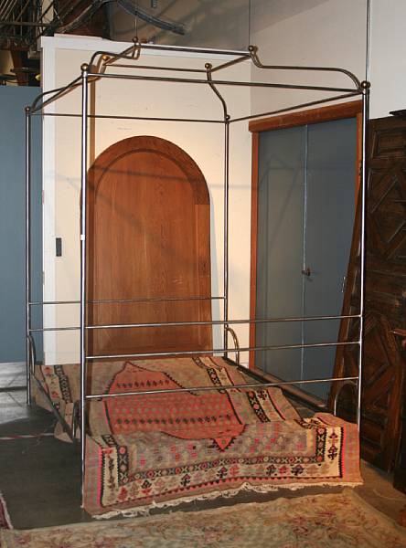 Appraisal: A Contintental steel and brass canopy bed