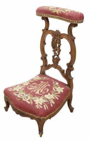 Appraisal: French carved prayer chair th c needlepoint upholstery to the