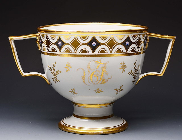 Appraisal: A TH CENTURY ENGLISH PORCELAIN TWO HANDLED LOVING CUP with