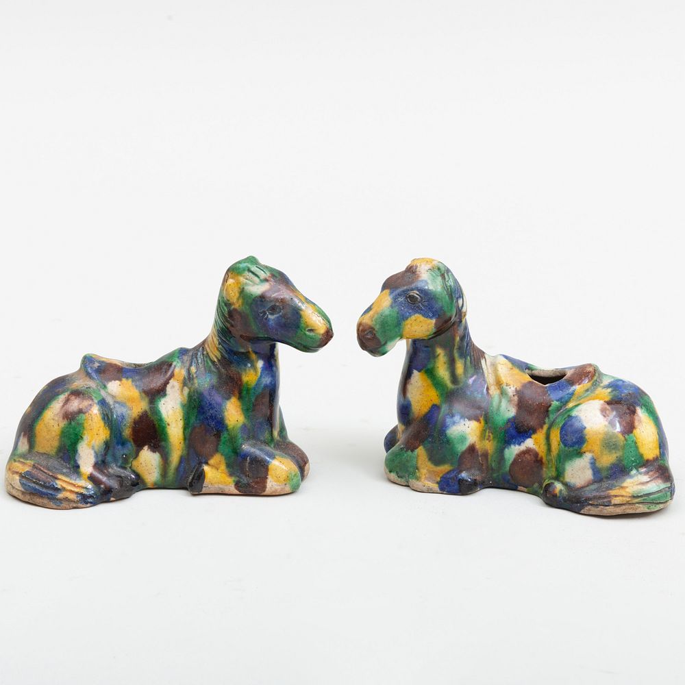 Appraisal: Pair of Tang Style Splatter Glazed Models of Recumbant Horses