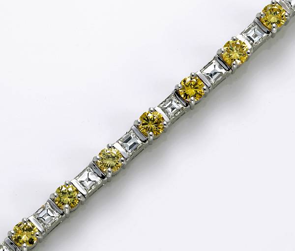 Appraisal: A colored diamond and diamond bracelet yellow diamonds weighing an