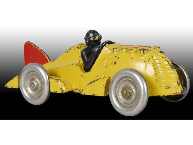 Appraisal: Cast Iron Hubley Yellow Racer Car Toy with Driver Description