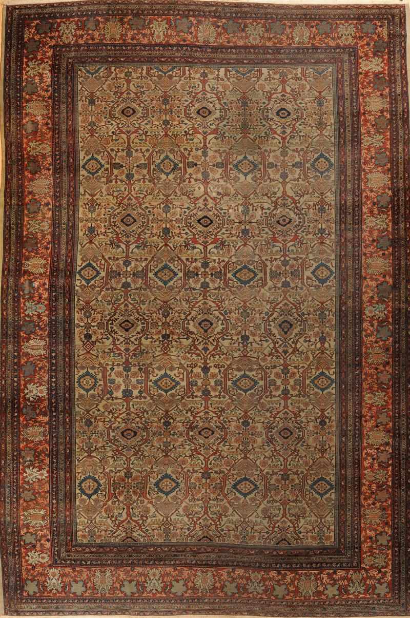 Appraisal: PERSIAN TAN-GROUND CARPET Worked with floral and foliate trellis within