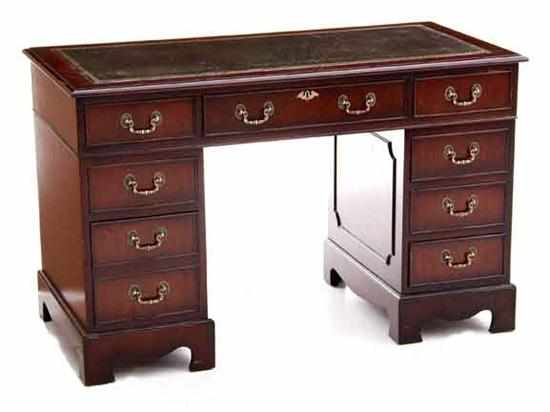 Appraisal: George III style mahogany kneehole desk rectangular top with inset