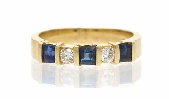 Appraisal: A Karat Yellow Gold Diamond and Sapphire Ring containing three