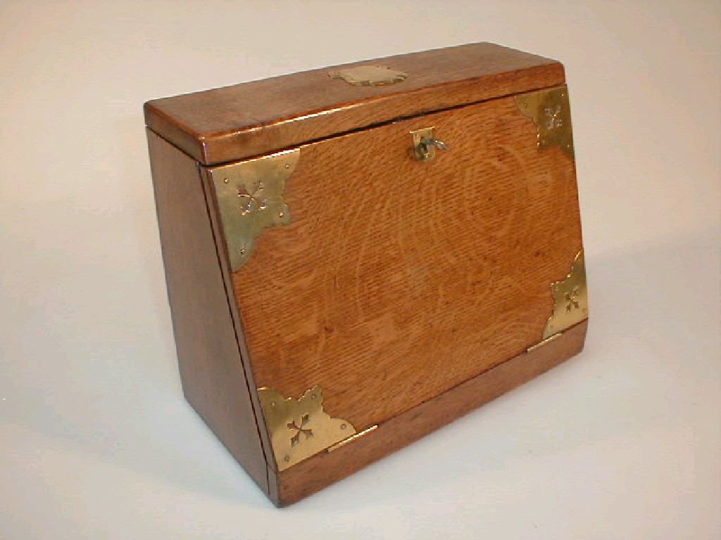 Appraisal: A late thC oak stationary box with brass mounts the