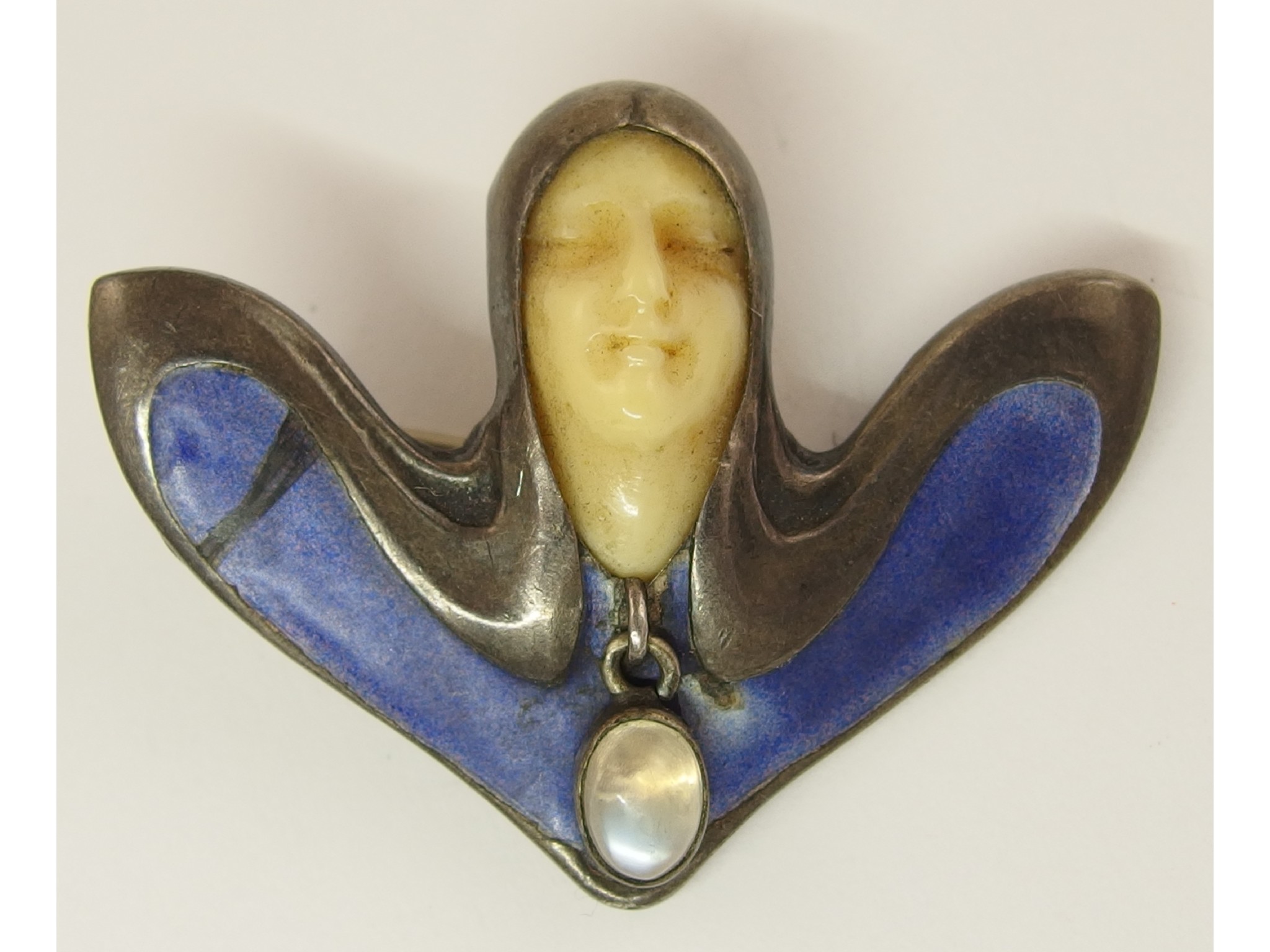 Appraisal: A Theodor Fahner Art Nouveau broochthe carved ivory face is