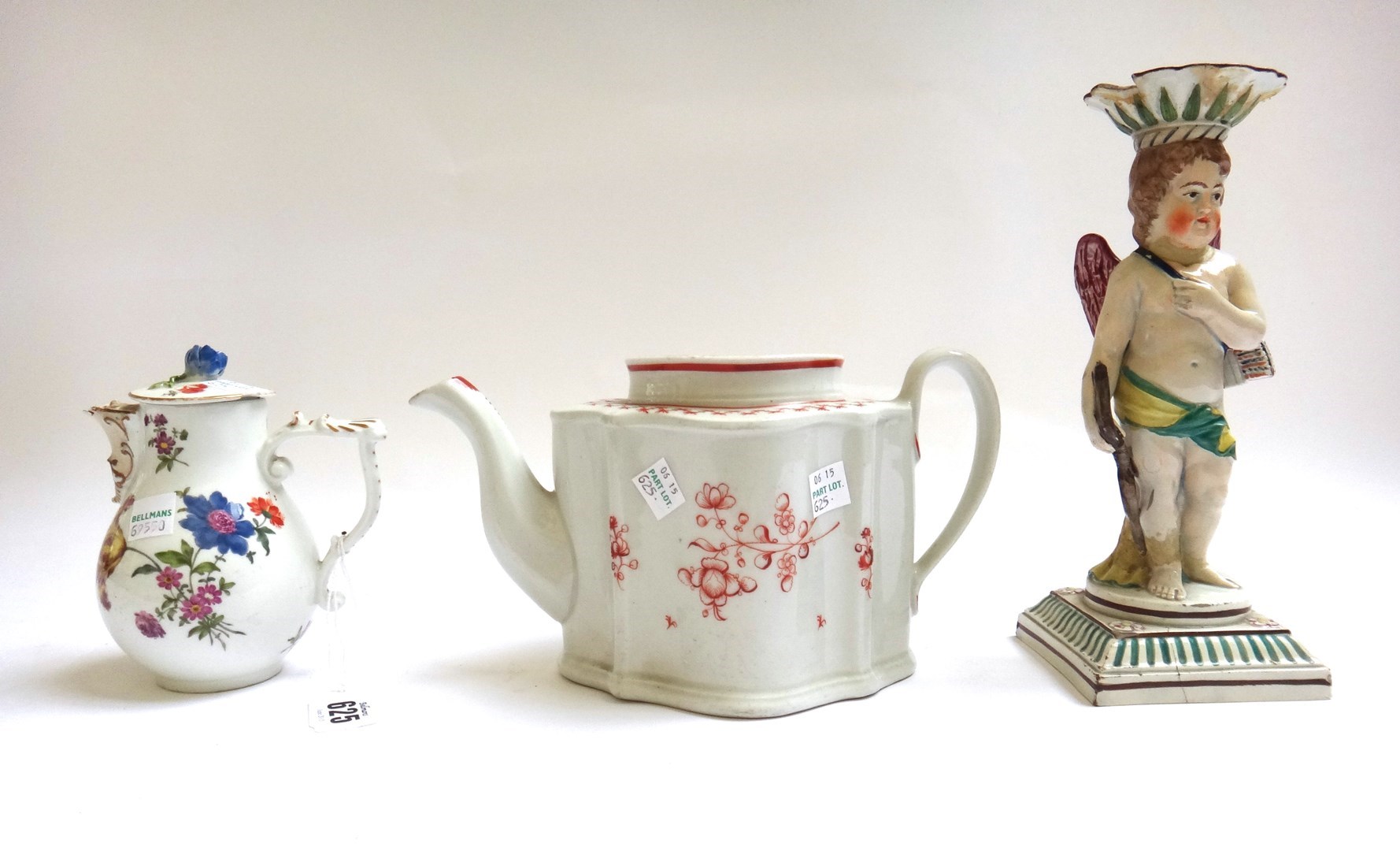 Appraisal: A Meissen pear shaped milk jug and cover circa painted