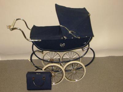 Appraisal: A Silver Cross doll's pram coach built in blue with