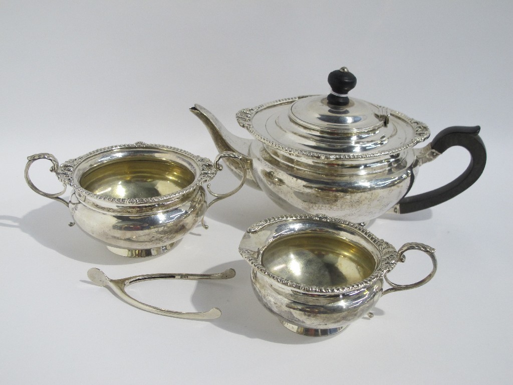 Appraisal: A three piece silver tea service Edinburgh and a pair