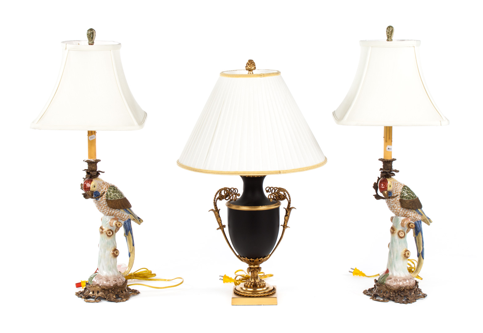 Appraisal: Three table lamps with shades pair of ceramic gilt-metal-mounted parrot