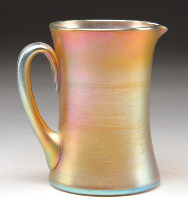 Appraisal: TIFFANY STUDIOS PITCHER Lovely Tiffany pitcher has corset shaped body